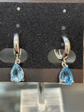 Sterling silver pear shaped blue topaz dangle hoop earrings