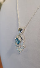 Load image into Gallery viewer, Sterling silver blue topaz Hamsa heart pendant