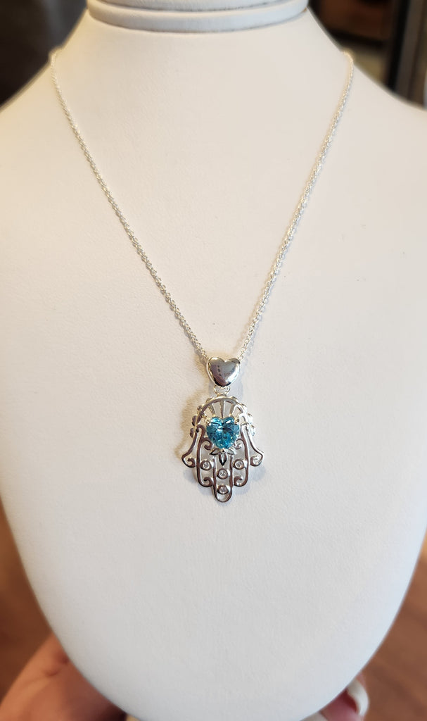 Sterling silver blue topaz Hamsa heart pendant