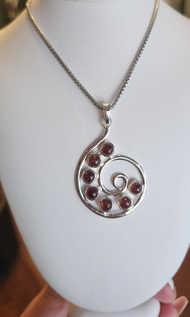 Sterling silver pink tourmaline spiral pendant