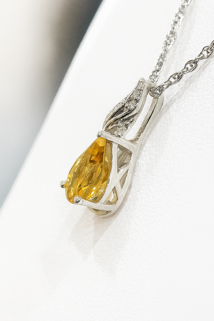 Sterling silver citrine pendant with diamonds