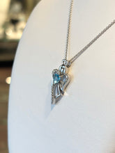 Load image into Gallery viewer, Sterling silver blue topaz heart angel pendant