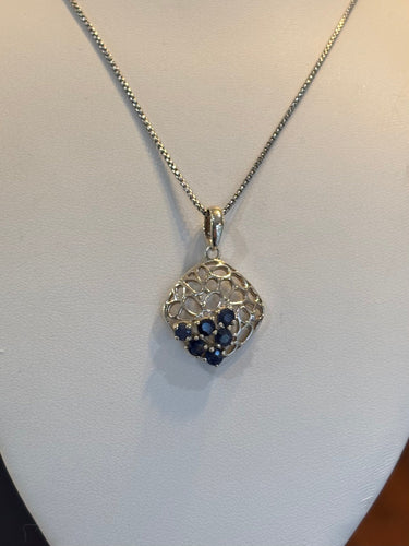 Sterling silver multi-stone blue sapphire pendant