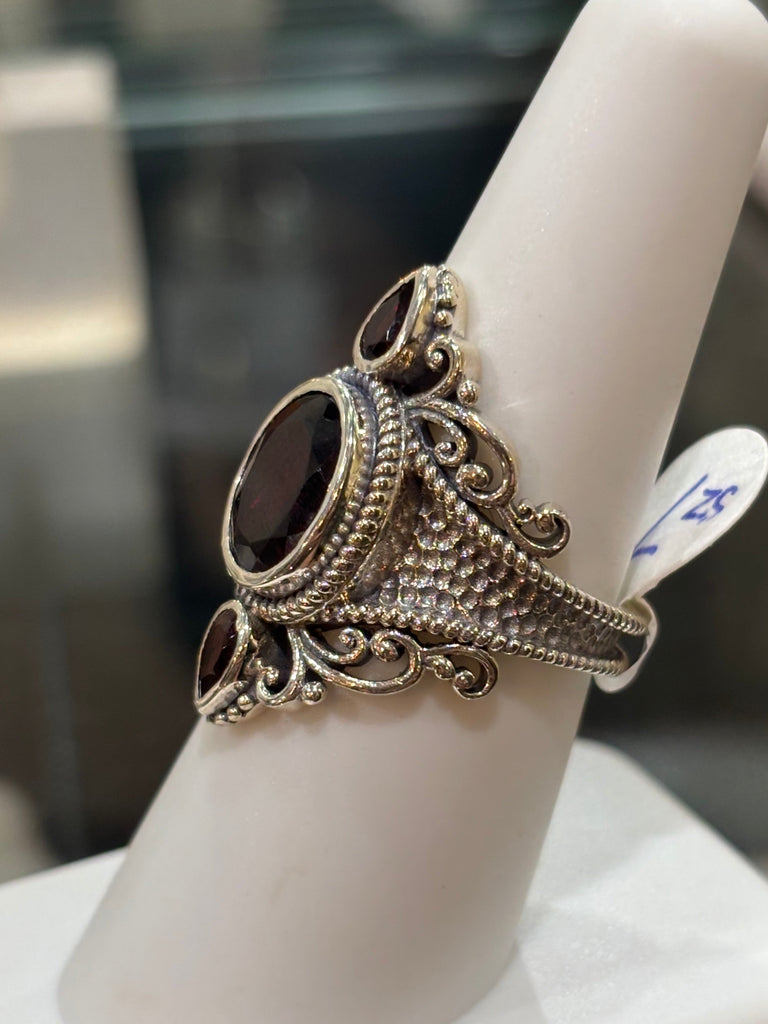 Sterling silver three stone garnet statement ring