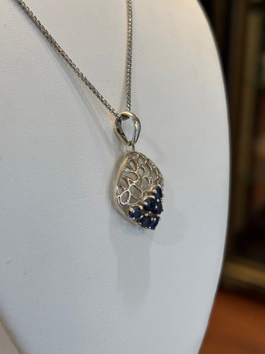 Sterling silver multi-stone blue sapphire pendant