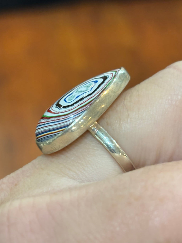 Sterling silver pear-shaped fordite cabochon ring