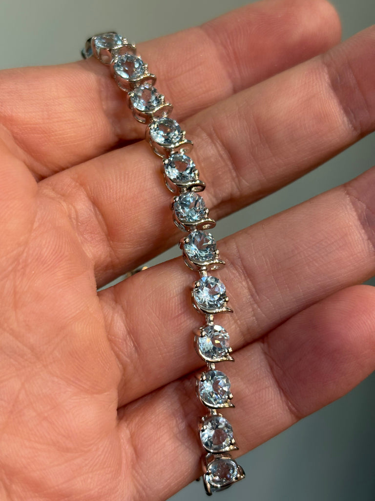 Sterling silver blue topaz tennis bracelet