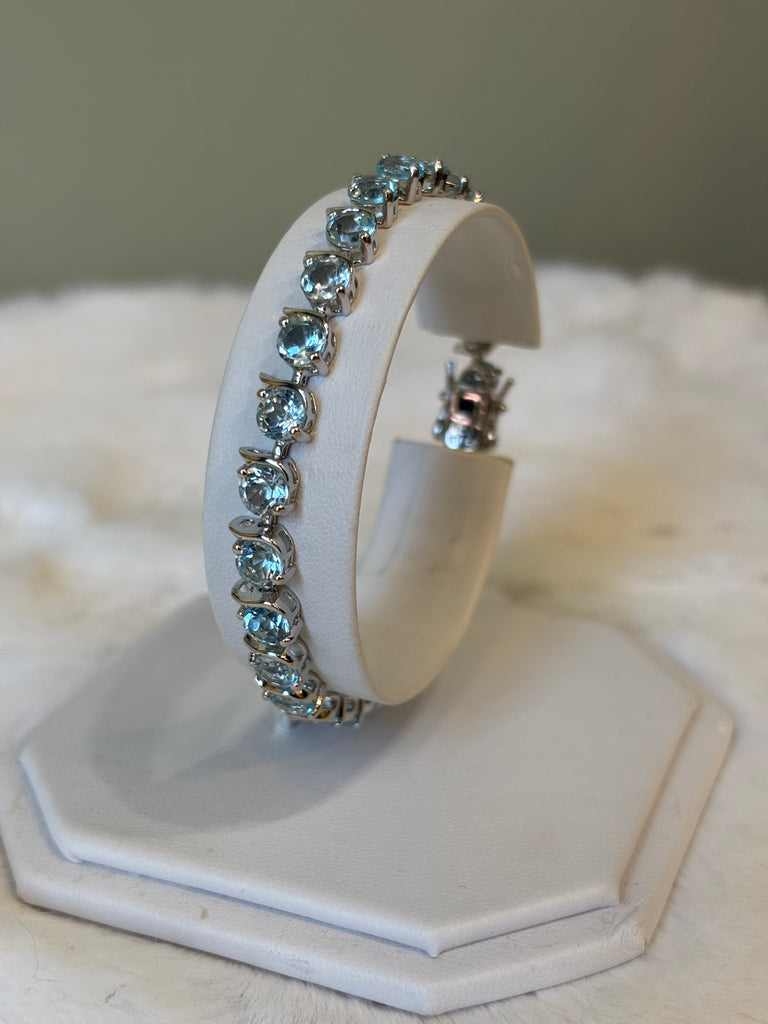 Sterling silver blue topaz tennis bracelet