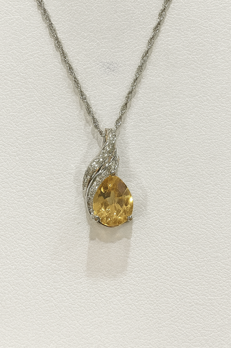 Sterling silver citrine pendant with diamonds
