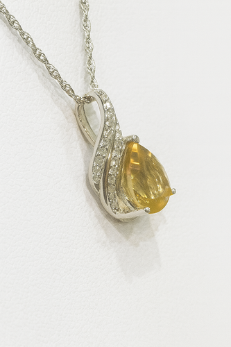 Sterling silver citrine pendant with diamonds