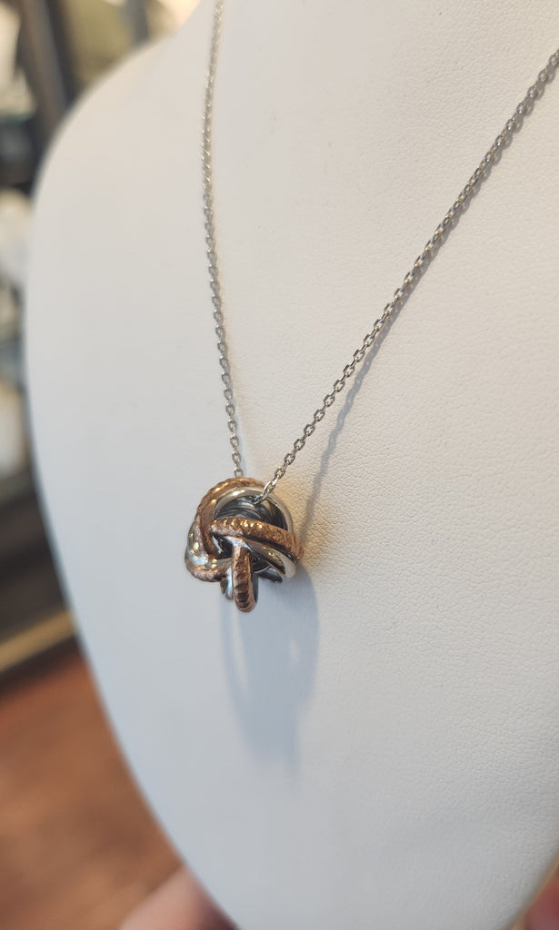 Sterling silver two-toned knot pendant