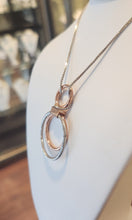 Load image into Gallery viewer, Sterling silver two-toned rings pendant