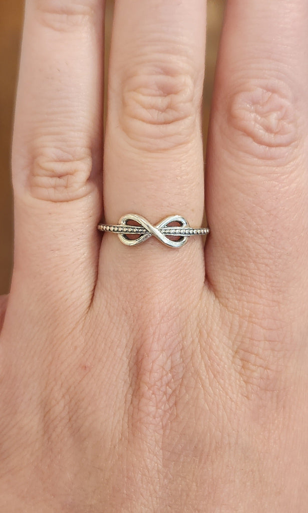Sterling silver textured infinity ring