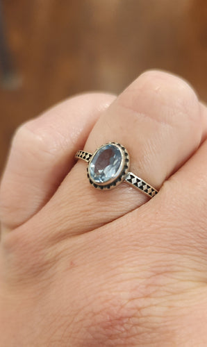Sterling silver faceted oval blue topaz ring