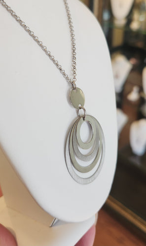 Sterling silver pendant with textured circles