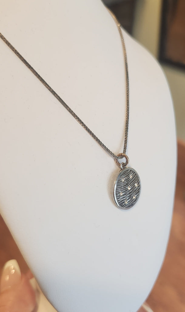 Sterling silver round cubic zirconia pendant