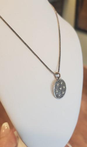 Sterling silver round cubic zirconia pendant