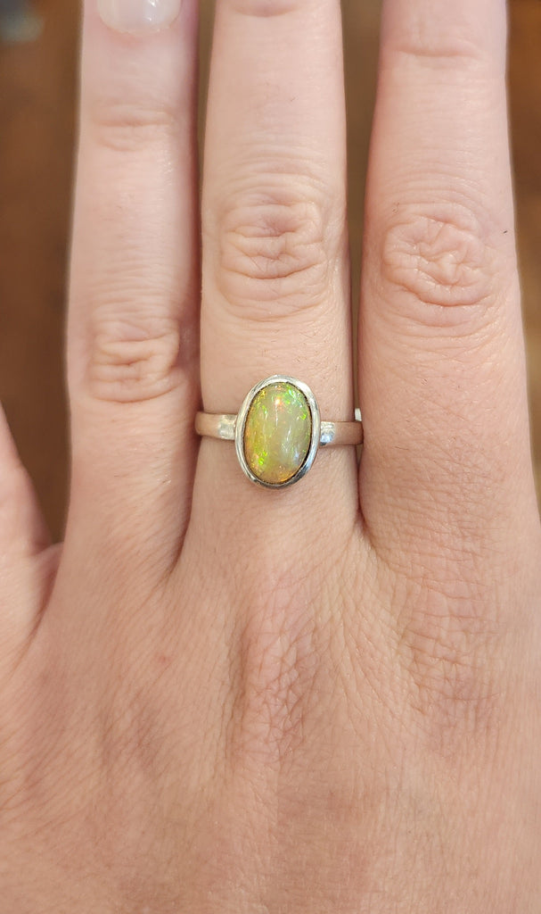 Sterling silver oval Ethiopian opal cabochon ring