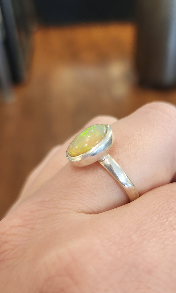 Sterling silver oval Ethiopian opal cabochon ring