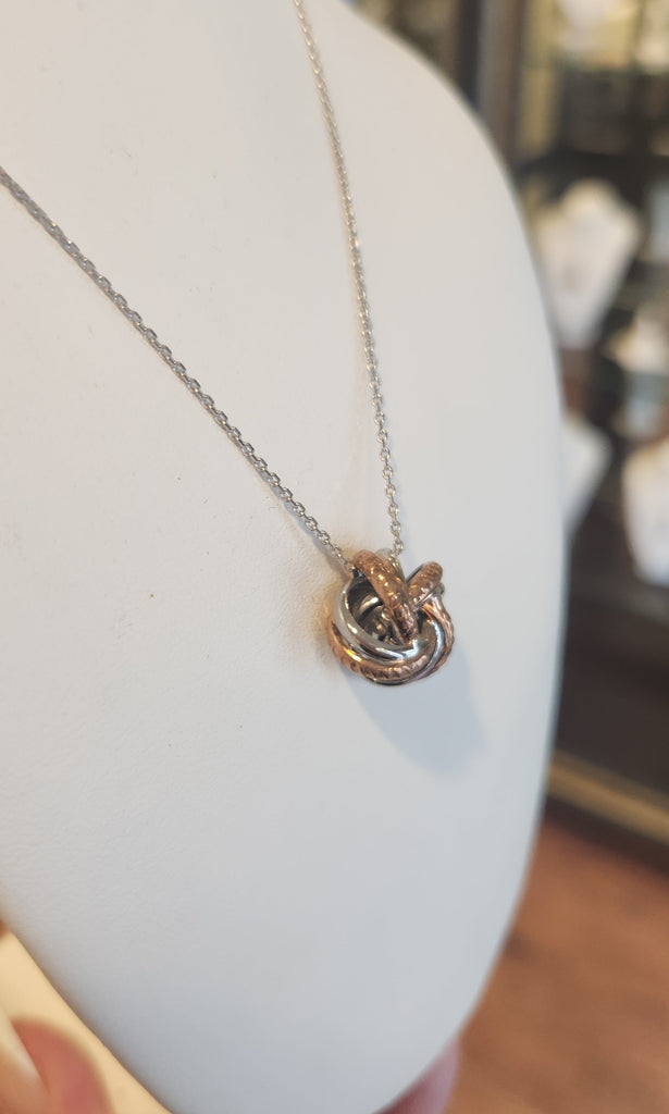 Sterling silver two-toned knot pendant