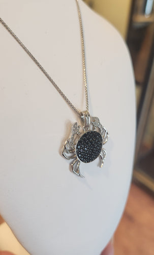 Sterling silver crab pendant with black & white diamonds