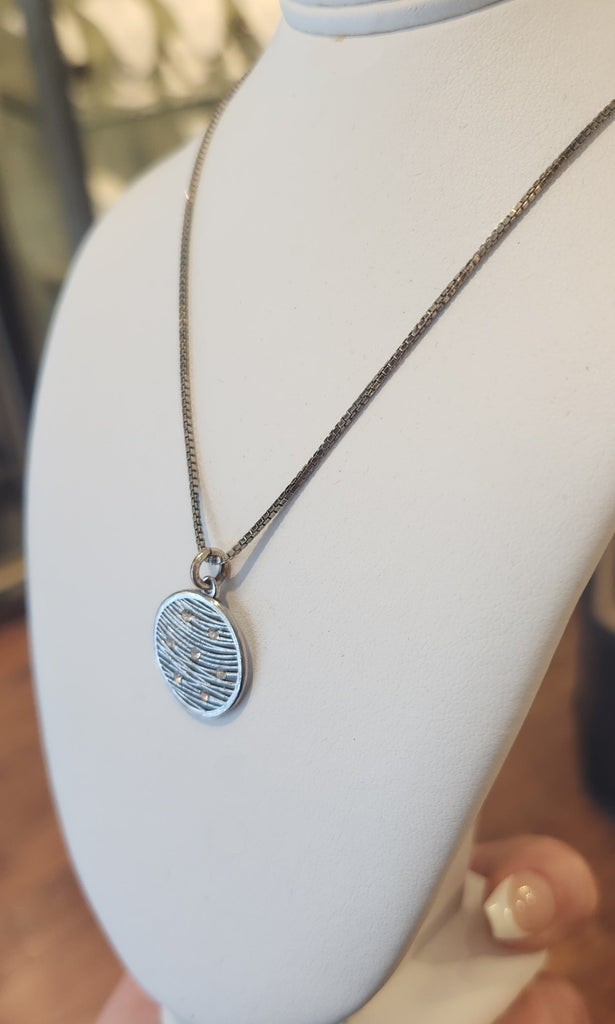 Sterling silver round cubic zirconia pendant