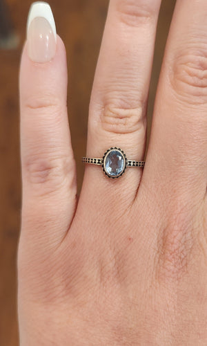 Sterling silver faceted oval blue topaz ring